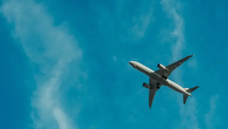 Plane in the blue sky